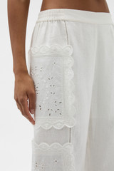 Profile view of model wearing the Oroton Handkerchief Pyjama Pant in Antique White and 100% mid-weight linen fabric for Women . IP:4