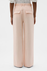 Profile view of model wearing the Oroton Flat Front Pant in Nougat and 100% heavy linen fabric for Women . IP:5