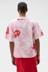 Profile view of model wearing the Oroton Cabana Floral Wrap Shirt in Rose and 100% silk dupion fabric for Women . IP:5