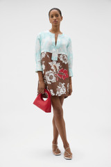 Profile view of model wearing the Oroton Cabana Floral Tunic Dress in Glass/Chocolate and 100% silk dupion fabric for Women . IP:6