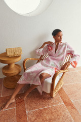 Profile view of model wearing the Oroton Cabana Floral Long Tunic Dress in Rose and 100% heavy linen fabric for Women . IP:9