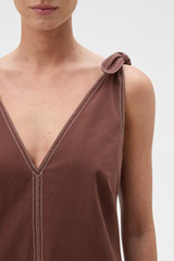 Profile view of model wearing the Oroton Tie Shoulder A-Line Dress in Milk Chocolate and 100% cotton fabric for Women . IP:4
