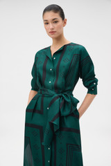 Profile view of model wearing the Oroton Spot Scarf Print Column Dress in HELM GREEN and 100% silk twill fabric for Women . IP:4