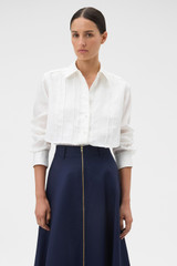Profile view of model wearing the Oroton Stitch Detail Shirt in White and 100% linen fabric for Women . IP:2