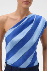 Profile view of model wearing the Oroton Slub Silk Stripe Top in Azure Blue and 100% silk fabric for Women . IP:4