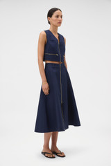 Profile view of model wearing the Oroton Zip Midi Skirt in North Sea and 100% cotton fabric for Women . IP:3