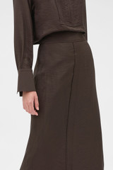 Profile view of model wearing the Oroton Midi Skirt in Dark Chocolate and 77% viscose and 23% polyamide blend fabric for Women . IP:4