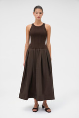 Profile view of model wearing the Oroton Knit Bodice Midi Dress in Dark Chocolate and Knit: 100% cotton; Skirt: 77% viscose, 23% polyester for Women . IP:2
