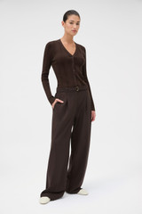 Profile view of model wearing the Oroton Belt Detail Pant in Dark Chocolate and 95% wool and 5% Lycra blend fabric for Women . IP:3