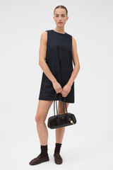 Profile view of model wearing the Oroton Denim Dress in Dark Denim and 100% cotton fabric for Women . IP:6