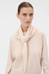 Profile view of model wearing the Oroton Scarf Knit in Rose Tint and 100% mid-gauge Merino wool fabric for Women . IP:4