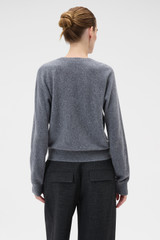 Profile view of model wearing the Oroton Scarf Knit in Grey Marle and 100% mid-gauge Merino wool fabric for Women . IP:5