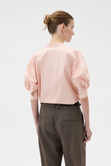 Profile view of model wearing the Oroton Sleeve Detail Shirt in Rose Tint and 100% cotton poplin fabric for Women . IP:4