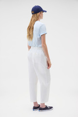 Profile view of model wearing the Oroton Arlo Carpenter Chino in Antique White and 100% cotton fabric for Women . IP:5