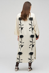 Profile view of model wearing the Oroton Graphic Floral Print Dress in Antique Cream and 81% viscose, 19% linen for Women . IP:9