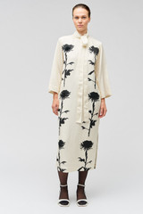 Profile view of model wearing the Oroton Graphic Floral Print Dress in Antique Cream and 81% viscose, 19% linen for Women . IP:3