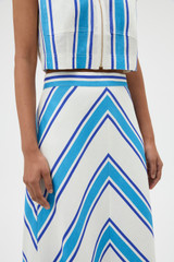 Profile view of model wearing the Oroton Shore Stripe Skirt in Sea Blue and 100% heavy linen fabric for Women . IP:4