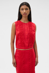 Profile view of model wearing the Oroton Ruffle Detail Top in Red Ribbon and 100% cotton voile fabric for Women . IP:2