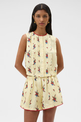 Profile view of model wearing the Oroton Wallpaper Floral Print Top in Lemon and 100% midweight linen fabric for Women . IP:2