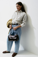 Profile view of model wearing the Oroton Boyfriend Check Shirt in Blonde and 100% cotton fabric for Women . IP:9