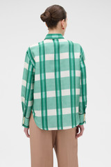 Profile view of model wearing the Oroton Ombre Check Silk Shirt in Neptune Green and 100% silk dupion fabric for Women . IP:5