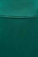 Profile view of model wearing the Oroton Double Satin Midi Skirt in Neptune Green and 100% viscose fabric for Women . IP:4