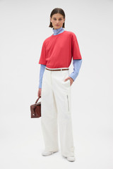 Profile view of model wearing the Oroton Relaxed Sleeve Tee in Market Red and 100% cotton fabric for Women . IP:2