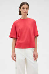 Profile view of model wearing the Oroton Relaxed Sleeve Tee in Market Red and 100% cotton fabric for Women . IP:3
