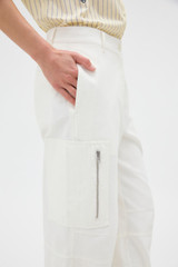 Profile view of model wearing the Oroton Zip Detail Pant in Antique White and 100% cotton fabric for Women . IP:3