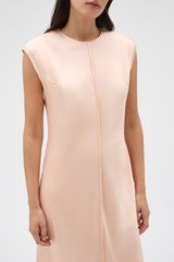 Profile view of model wearing the Oroton Double Satin Sheath Dress in Peach and 100% viscose fabric for Women . IP:4