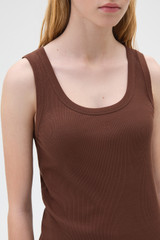 Profile view of model wearing the Oroton Scoop Neck Tank in Chocolate and 92% cotton and 8% spandex blend fabric for Women . IP:4