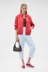 Profile view of model wearing the Oroton Arlo Carpenter Chino in Pale Blue and 100% cotton fabric for Women . IP:6