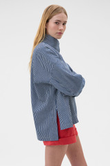 Profile view of model wearing the Oroton Washed Weekend Stripe Parka in Dark Navy and 100% cotton fabric for Women . IP:3