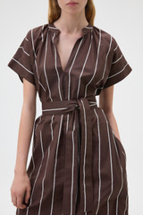 Profile view of model wearing the Oroton Stripe Detail Dress in Milk Chocolate and 100% cotton fabric for Women . IP:4