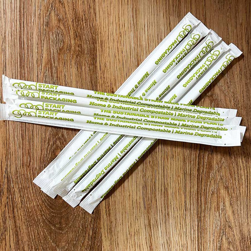 Straw wrapper with text 'The Sustainable Straw Made From Plants. Home & Industrial Compostable | Marine Degradable