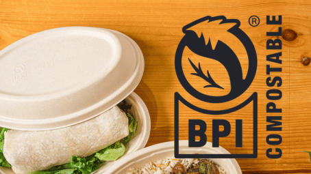 BPI swirl logo mark on wood background with burrito bowl