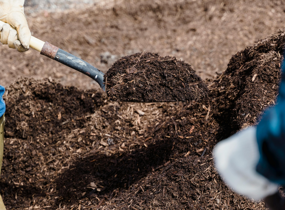 compost pile with shovel