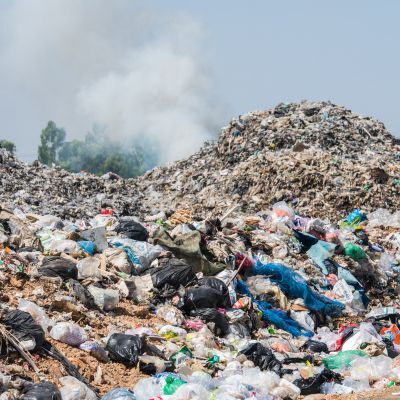large landfill with smoke