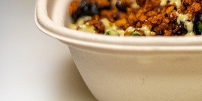 close up of a dish in a sugarcane fiber tray