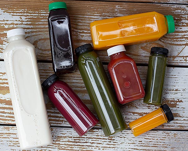 Compostable juice bottles. HPP juice. A Plant-based product in a plant  bottle.