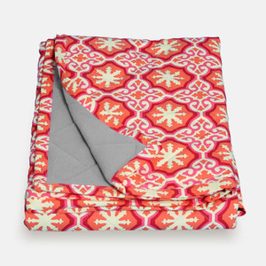 orange, red, pink and cream-colored pet blanket orange, red, pink and cream-colored pet blanket