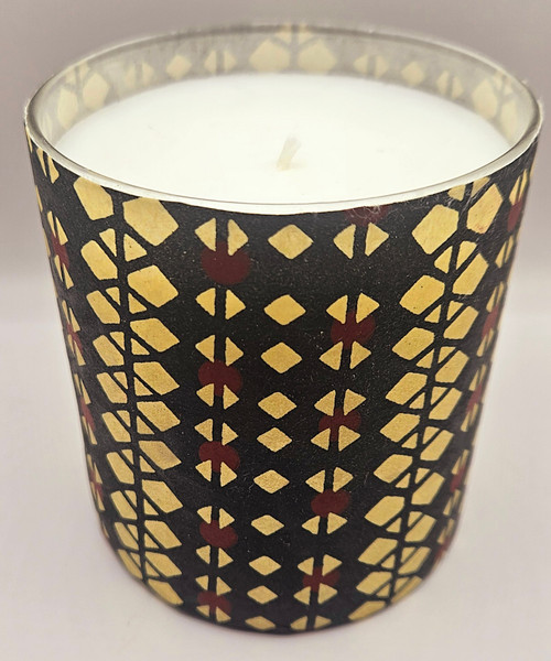 This is a stenciled design of black, brown and cream colored diamond shapes