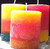 3"x3" Pillar Candles -Round.  three candles each with three layers. One yellow, orange, turquoise. one yellow, red, orange. one red, orange yellow.  All have paper wicks.