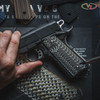 VZ Operator II™ Predator Green G-10 being installed on a black 1911