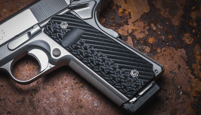 Black VZ custom 1911 grips on a 1911 pistol