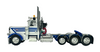 60-1674C  1/64  White/Blue  Peterbilt® Model 389 Tri-Axle Day Cab with Stainless Fenders