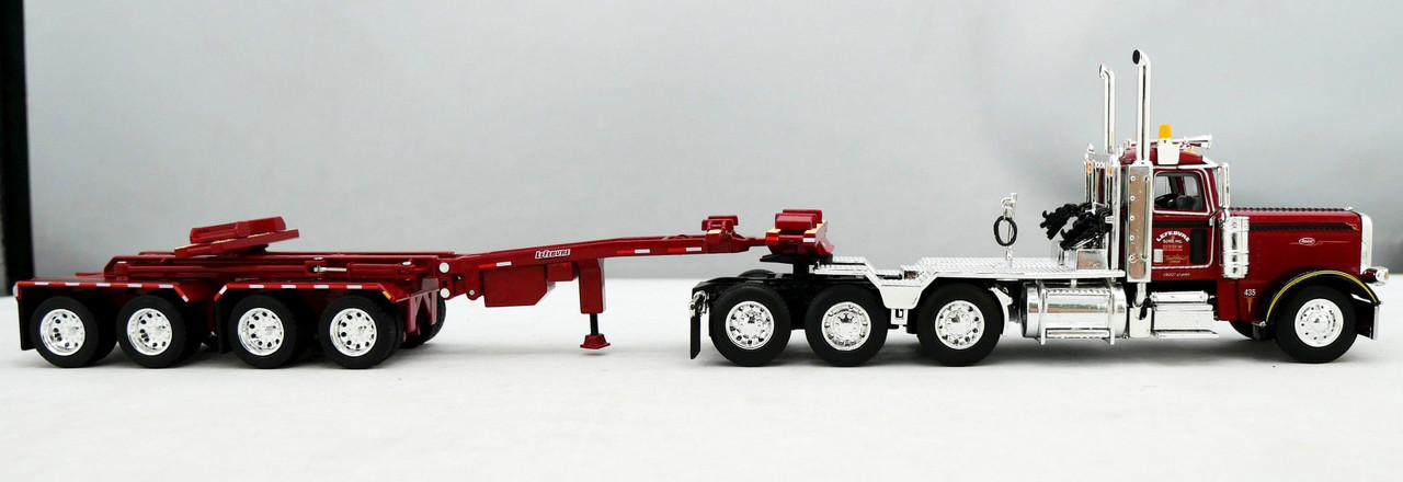 Peterbilt MODEL 389 トレーラーミニカー Amazon.com: New Ray Peterbilt 389 Truck with Flatbed Trailer