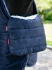 You'll wonder how you coped without this versatile, reversible protection pad! Its versatile functionality is perfect for whenever you need it.

Featuring deep pile faux fur on one side for extra comfort when layering rugs, it's ideal to protect your sensitive horse against rubbing at the chest - it tucks and folds over the front of the rug.

Compatible with all LeMieux rugs, it holds itself in position without the need for attachments or fixings.