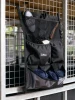 Create extra wall storage with this clever hanging organiser. Large, sturdy pockets are ideal for stashing treats, brushes, gloves, hoof picks, boots, vet wrap...!

A combination of elasticated mesh pockets, open pockets and a more secure zipped pocket back onto sturdy fabric that will take the load with ease.

It hangs up with two easy-to-shift hook and loop webbing straps for go-anywhere convenience.
