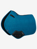 Now with a New Super Soft Suede Binding and New PU Leather Girth Protection area, the classic Close-Contact cut from LeMieux is designed to fit a wide range of more forward cut jumping saddles. Now one of the most iconic jumping pads with its high wither, elasticated D-Ring tabs and swept back profile . These saddle pads offer a very sleek and professional look to anyone’s saddle. The luxurious suede top side and new soft suede binding is complimented by super soft Bamboo lining which absorbs & controls sweat under the saddle and is beautifully comfortable and secure - minimising friction even on sensitive skinned horses. Girth keepers incorporate inner locking loops to offer more girthing options.